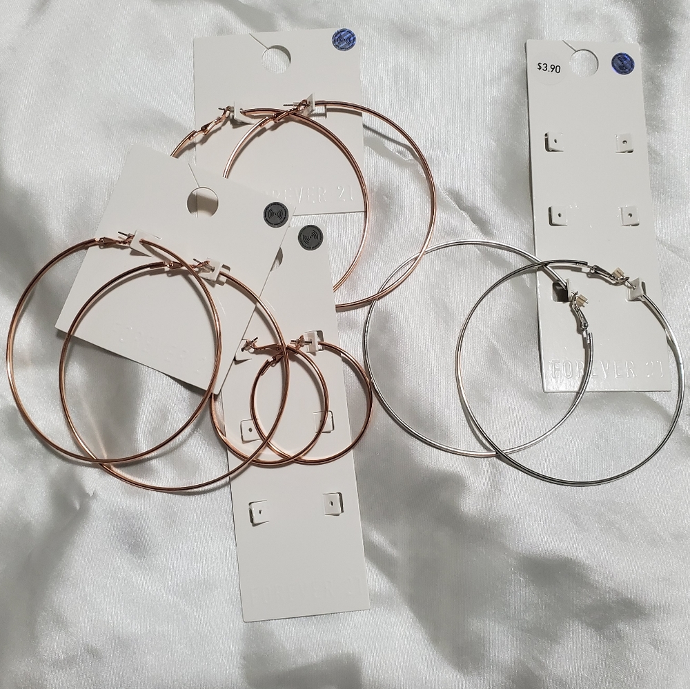 Large rose gold and silver hoop earrings